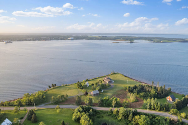 st andrews beach house drone shot view of main residence, brudenell river, and georgetown