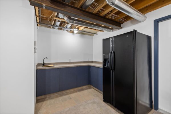 st andrews beach house main residence lower level common area fridge and bar