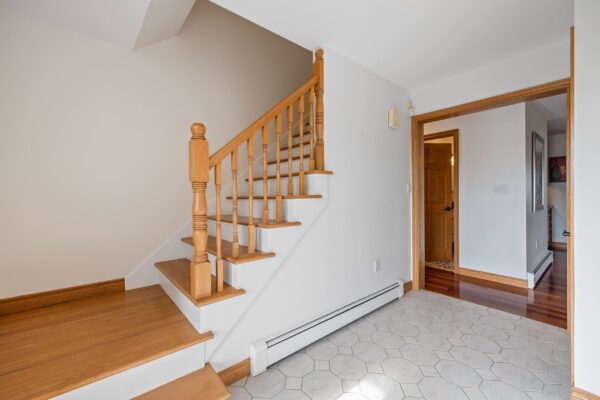 st andrews beach house main residence interior front entry foyer stairwell to upper level