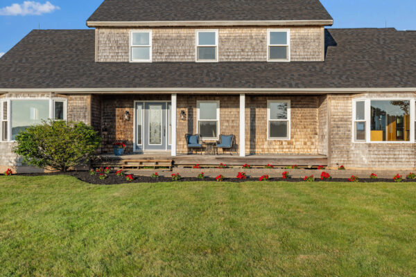 View of front of main residence. St. Andrews Beach House. Waterfront property for sale.